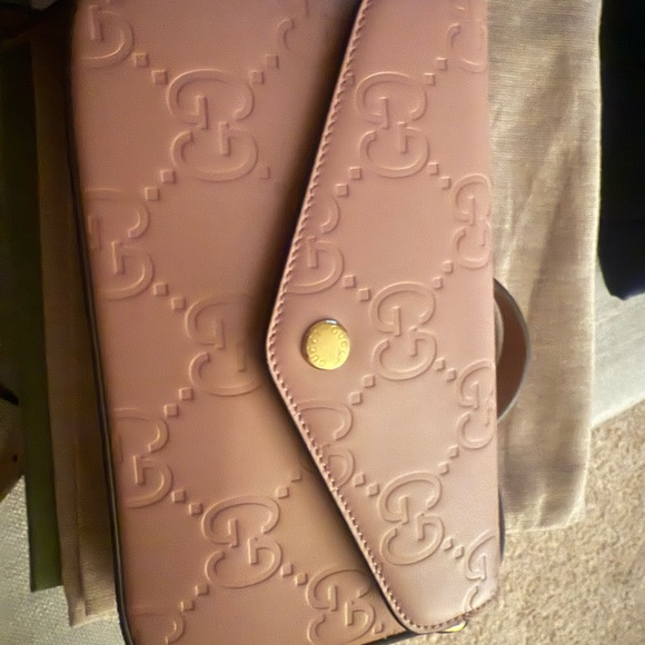 Gucci Handbags - Gucci Blush Embossed Leather Clutch